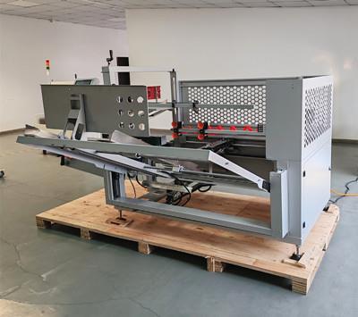 《走進封箱機》伺服高速開箱機在食品行業(yè)中的應(yīng)用